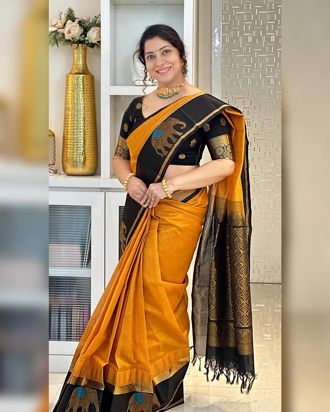 Mustard Yellow Silk Saree with Black Elephant Motif Border