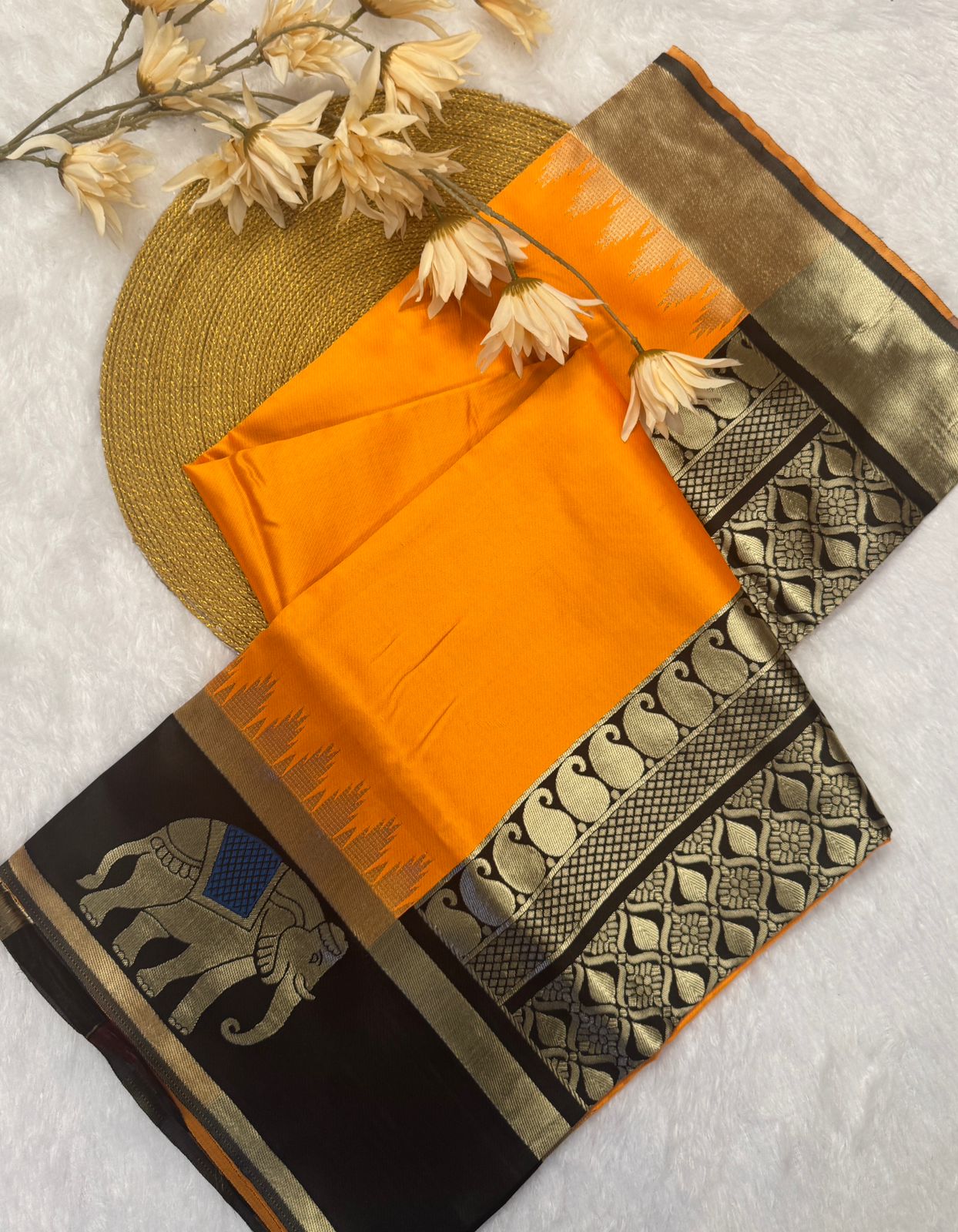 Mustard Yellow Silk Saree with Black Elephant Motif Border