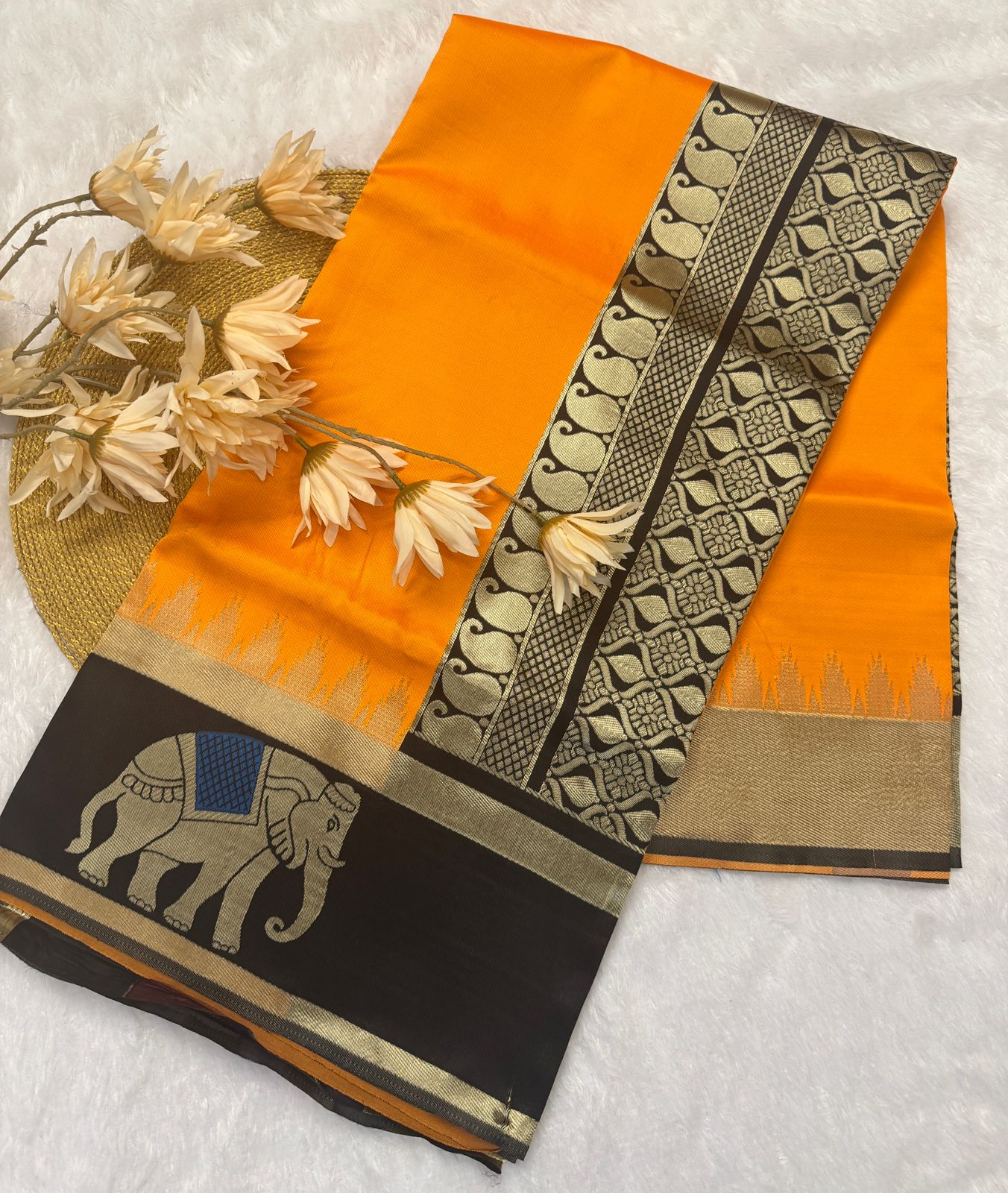 Mustard Yellow Silk Saree with Black Elephant Motif Border
