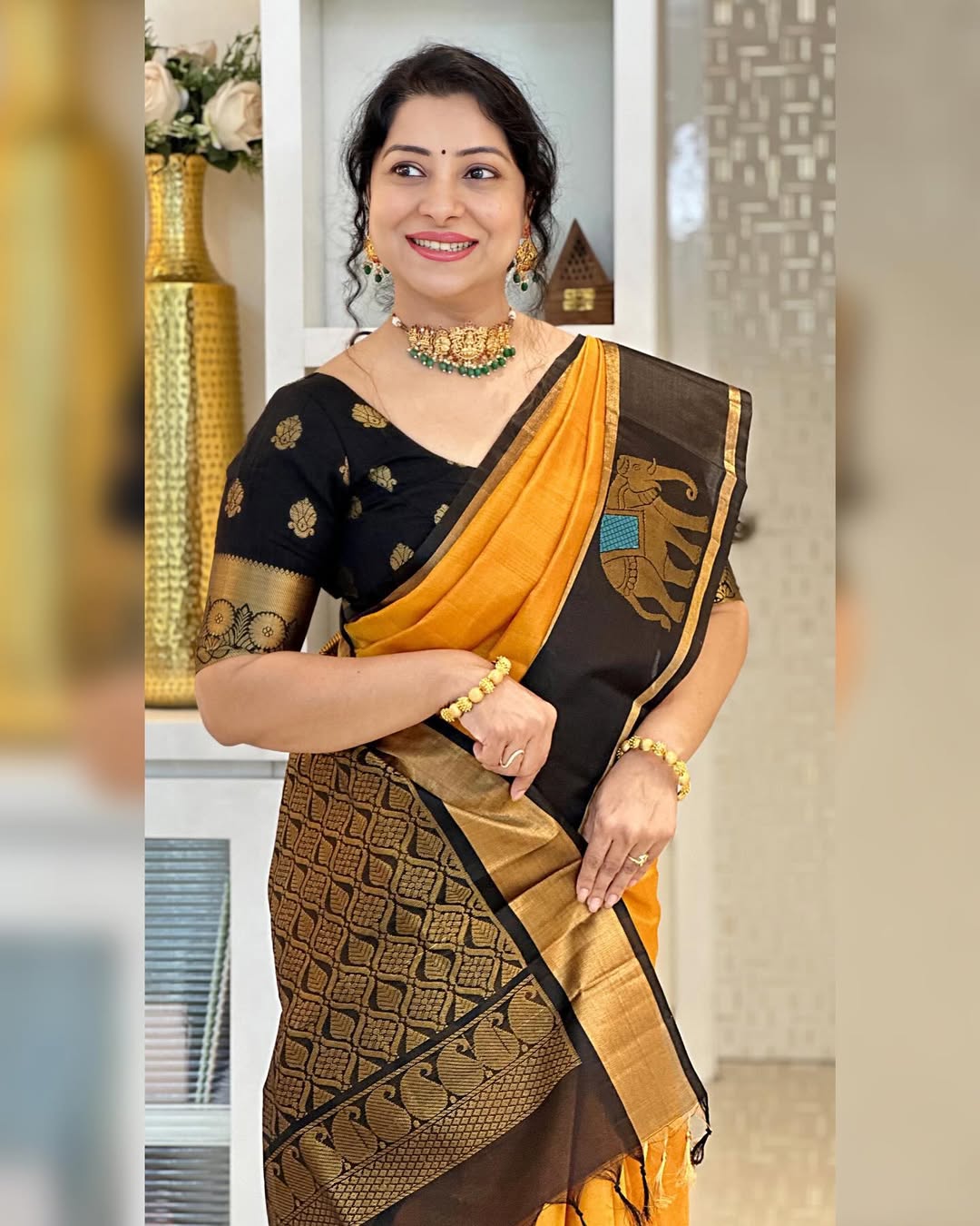 Mustard Yellow Silk Saree with Black Elephant Motif Border